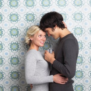 Young Couple Sharing Special Moment and Present
